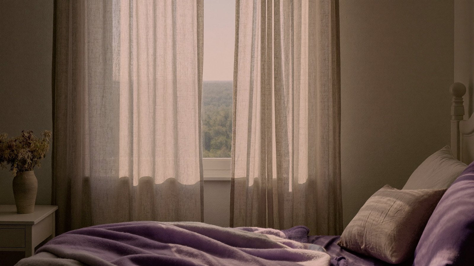 Calm, restful bedroom in soft light
